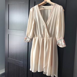 Beautiful detailed faux wrap dress